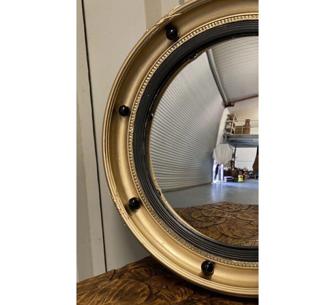 Regency Style Convex Mirror with Giltwood And Ebonised In Good Condition For Sale In Pulborough, GB