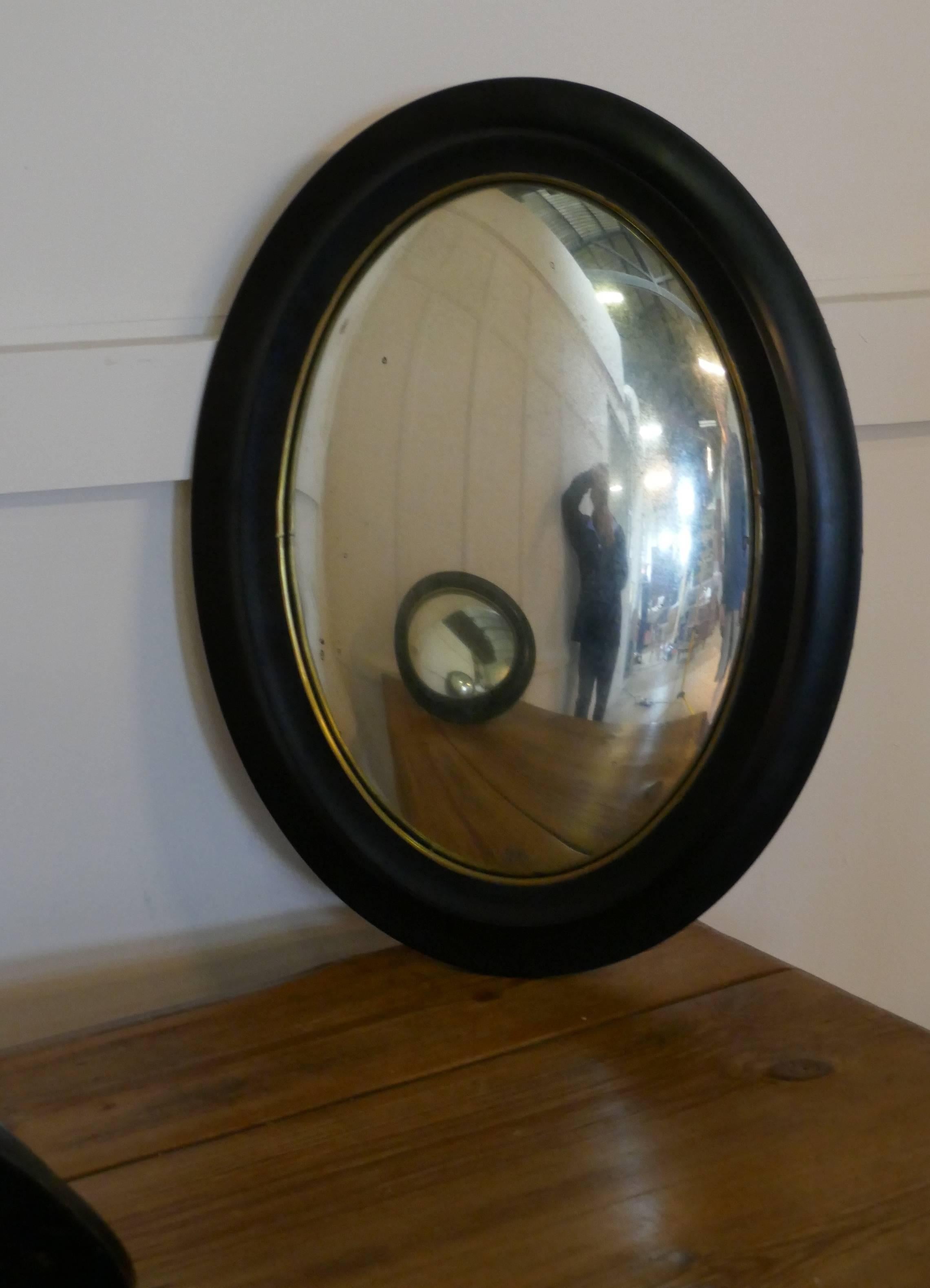 Regency Style Ebonised Convex Oval Wall Mirror 1