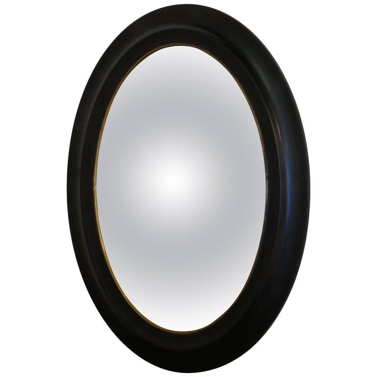 Regency Style Ebonised Convex Oval Wall Mirror For Sale at 1stdibs