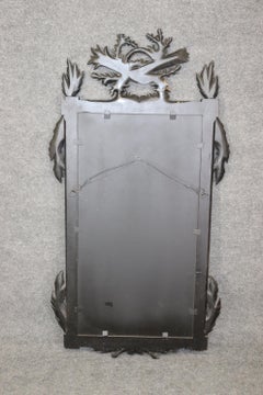 Regency Style Ebonized and Gilt Carved Floral Wall Hanging Mirror