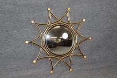 Regency Style Ebonized and Gilt Wall Hanging Sun Burst Mirror