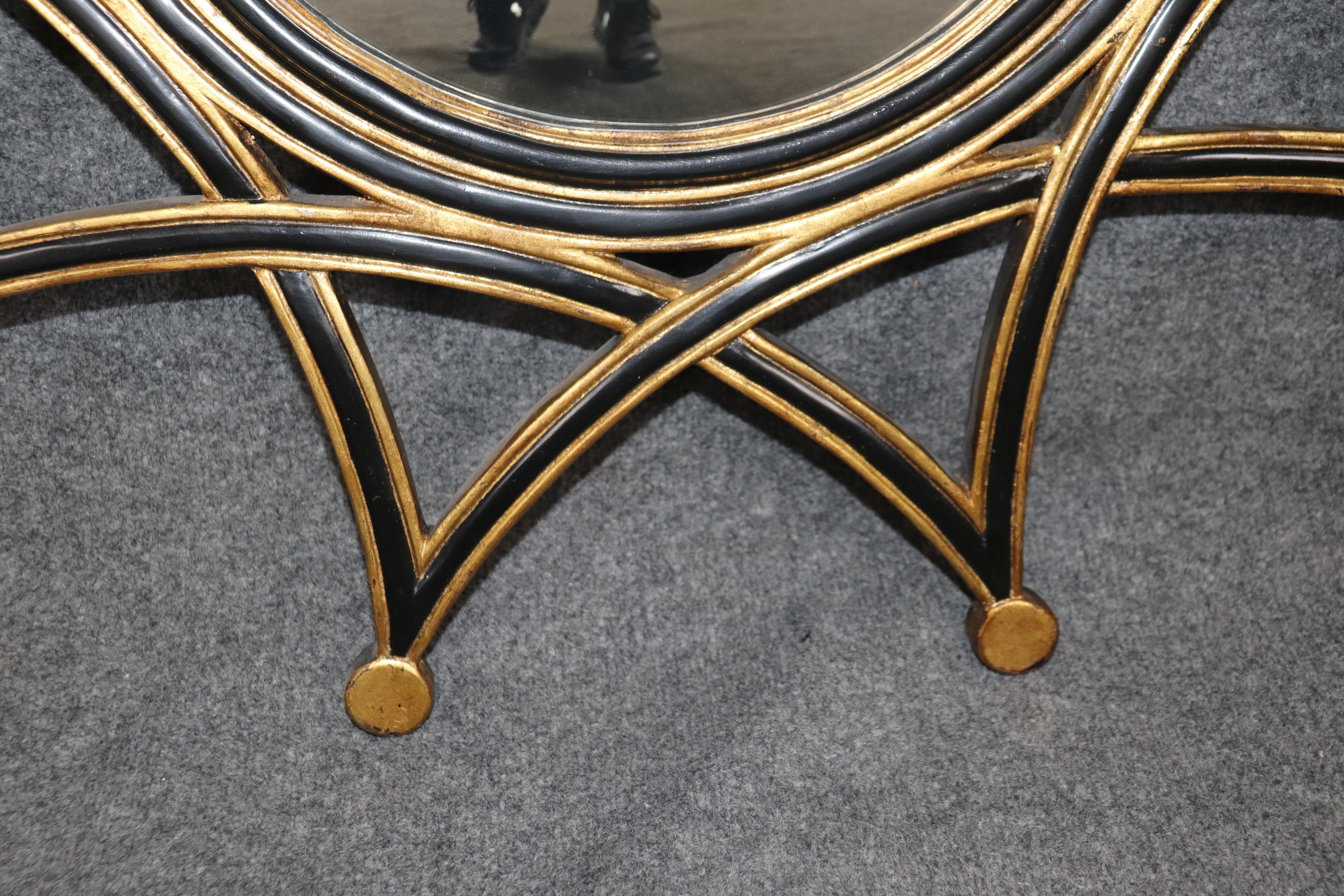 Espejo de Pared Ebonizado y Dorado Estilo Regencia Ráfaga de Sol siglo XX en venta