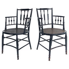 Regency Style Ebonized Arrow-back Slatted Armchairs with Caned Seats, Pair