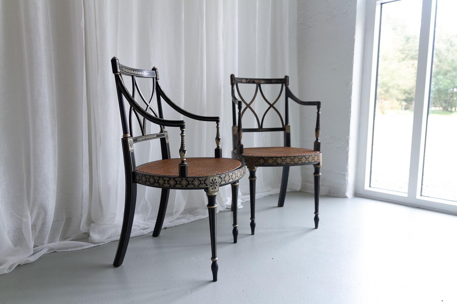 British Regency Style Ebonized Cane Armchairs, Set of 2. For Sale