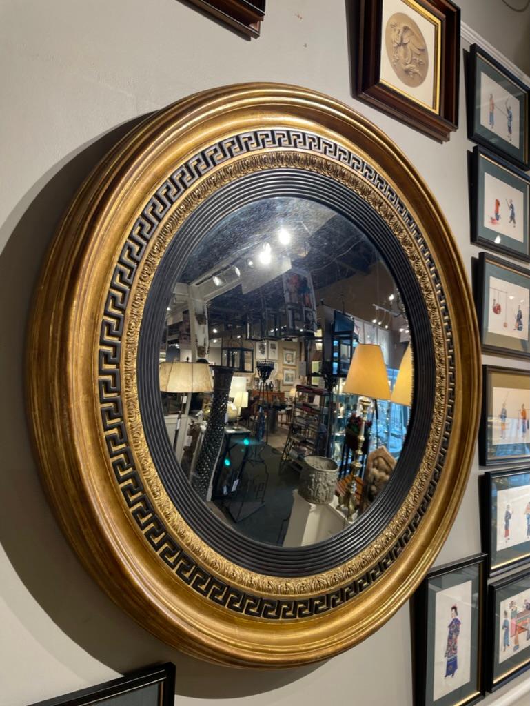 English Regency Style Ebonized Gilt Wood Convex Mirror with Greek Key Molding