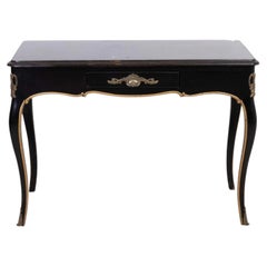 Escritorio de estilo Regency con tapa de mármol ebonizado y herrajes de latón
