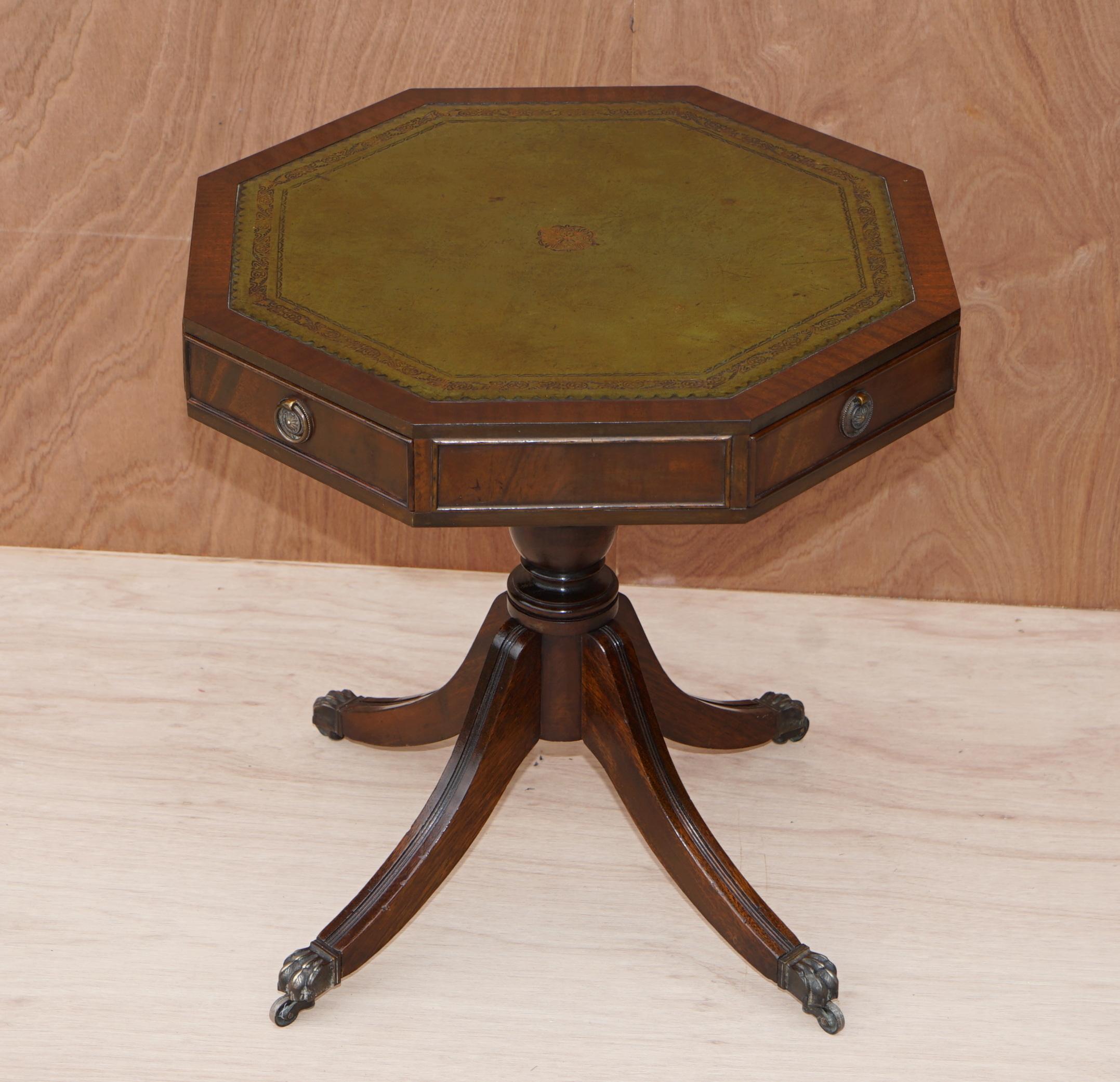 We are delighted to offer for sale this fully restored Regency style drum table with mahogany frame and green leather top 

A very good looking well made and decorative piece, ideally suited as a lamp wine or side table. It has been restored by my