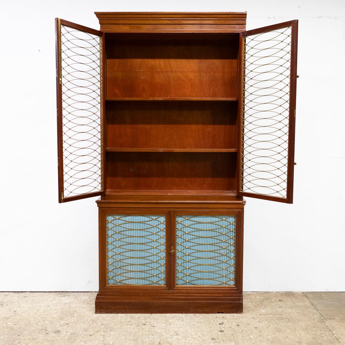 Along with various other pieces, this wonderful and complete set of bookcases was reclaimed from the Library room at the Clothworkers' Hall, London. 

An impressive collection, the Regency-style cabinets are finely crafted from mahogany. Curved