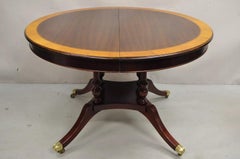 Table de salle à manger à rallonge ovale 48" en acajou de style Regency, à bandes rondes, avec feuille