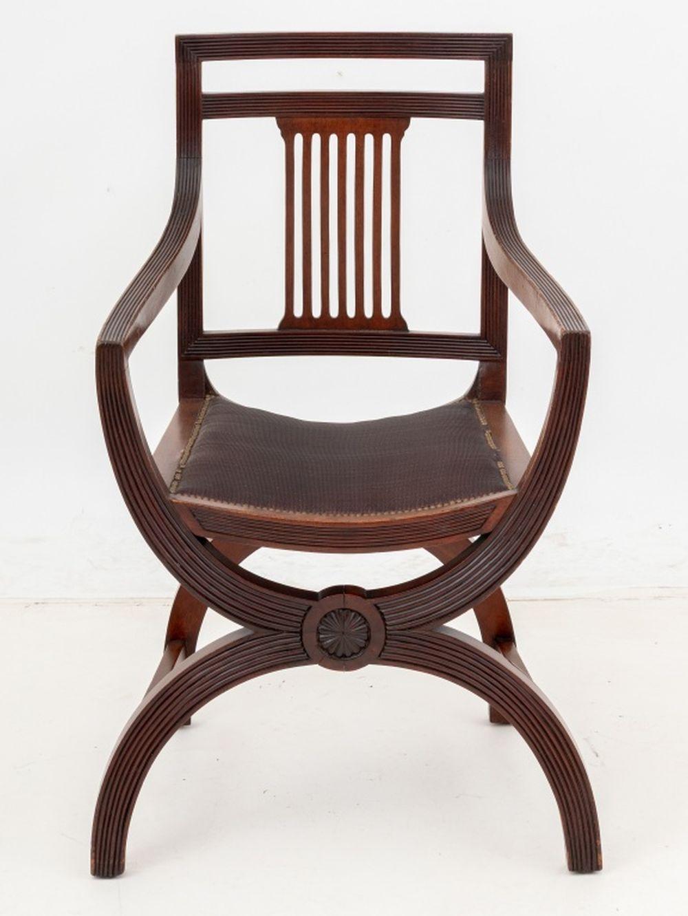 Regency Style Mahogany Armchair, in the manner of Thomas Hope, with pierced back splat on fluted X-frame conjoined by two stretchers. 36.5