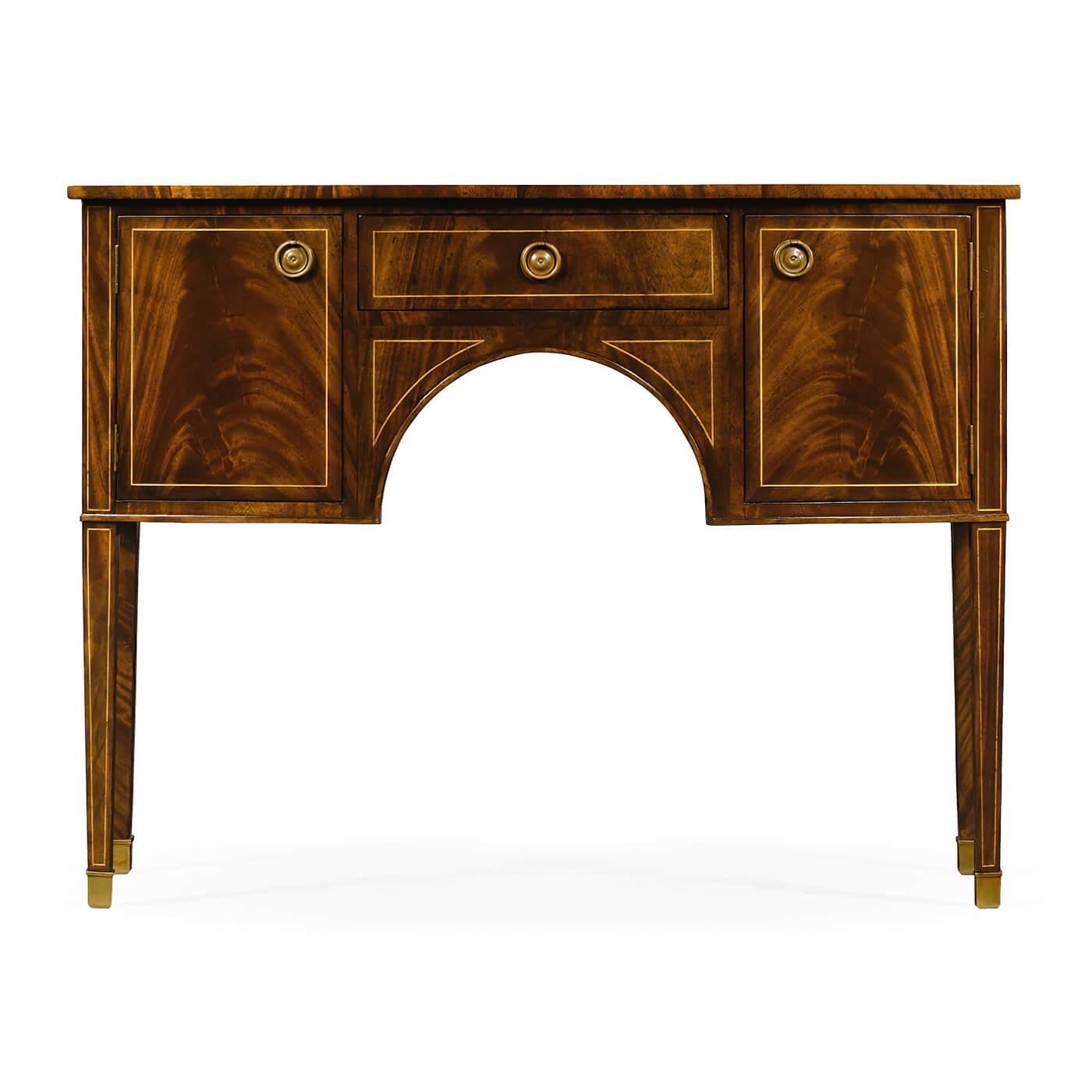 Regency style crotch mahogany sideboard, the bow front with two cupboards and a single drawer set on tapering square legs. Contrasting boxwood stringing throughout.


Dimensions: 50