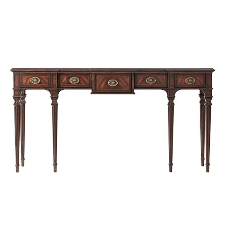 A flame mahogany console table, the breakfront molded edge top above five short crossbanded frieze drawers with fine brass handles, on square tapering fluted legs Inspired by a Regency original.

Dimensions: 66
