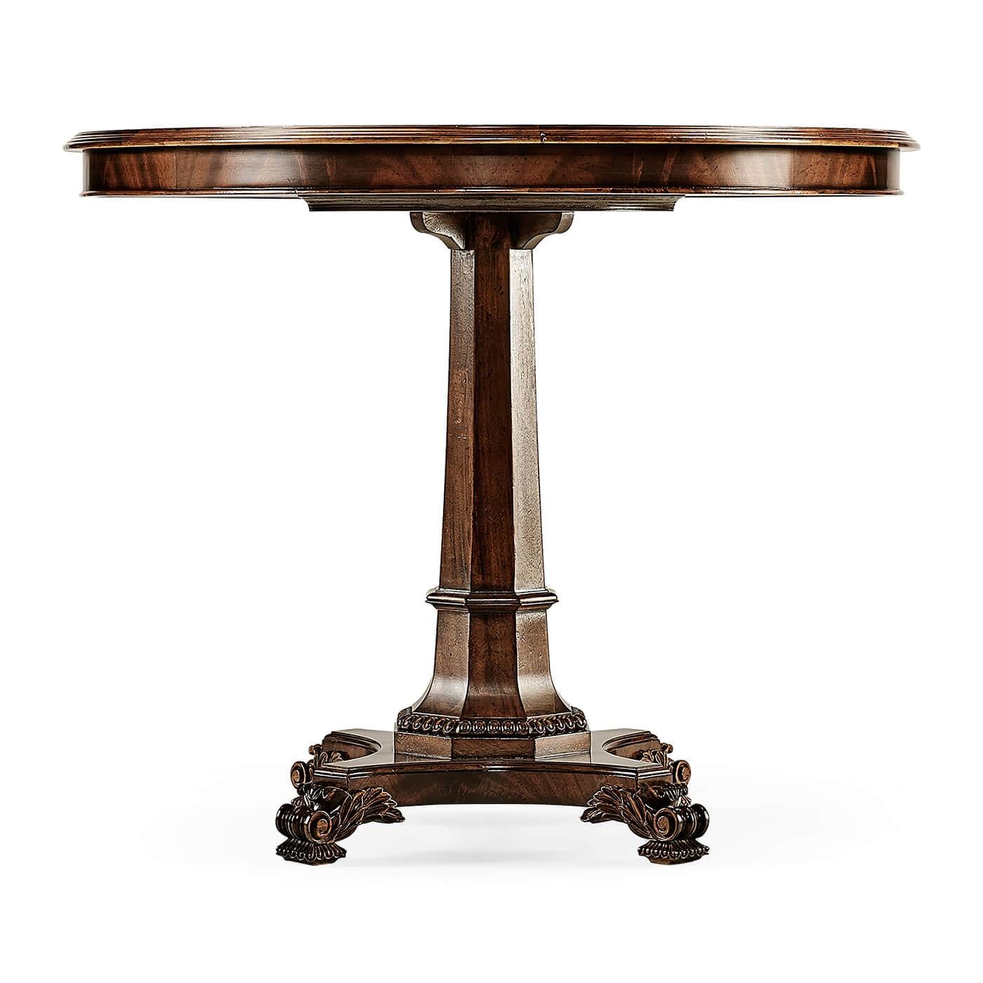 Regency style figured mahogany round center table with crossbanding and octagonal inlays. The octagonal tapering pedestal base supported by acanthus carved feet.

Dimensions: 36