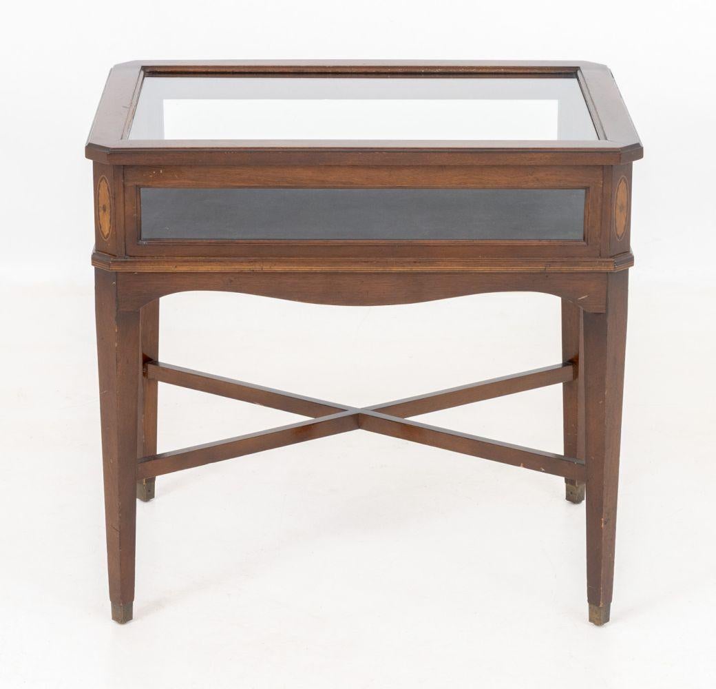 Regency Style Mahogany Display Table, with parquetry inlay details and glass paneled lift top opening to blue velvet lined interior above four tapered legs conjoined by X-form stretcher. 24.5