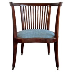 Antique Regency Style Mahogany Rolling Barrel Back Armchair