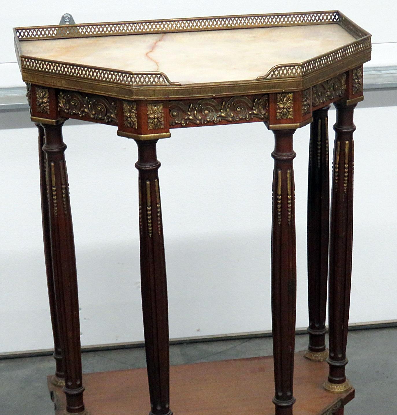 Regency style marble-top hall table with bronze gallery and accents.