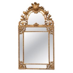 Regency-style mirror in gilded wood, 19th century