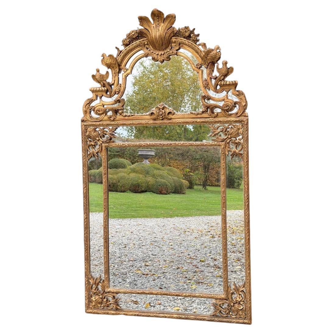 Regency-style mirror in gilded wood, 19th century en vente