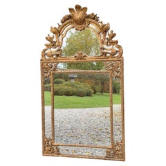 Regency-style mirror in gilded wood, 19th century