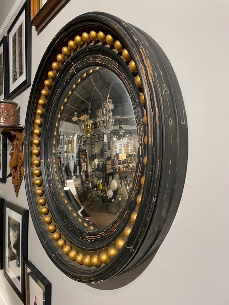 20th Century Regency Style Painted and Gilt Wood Round Convex Bullseye Mirror