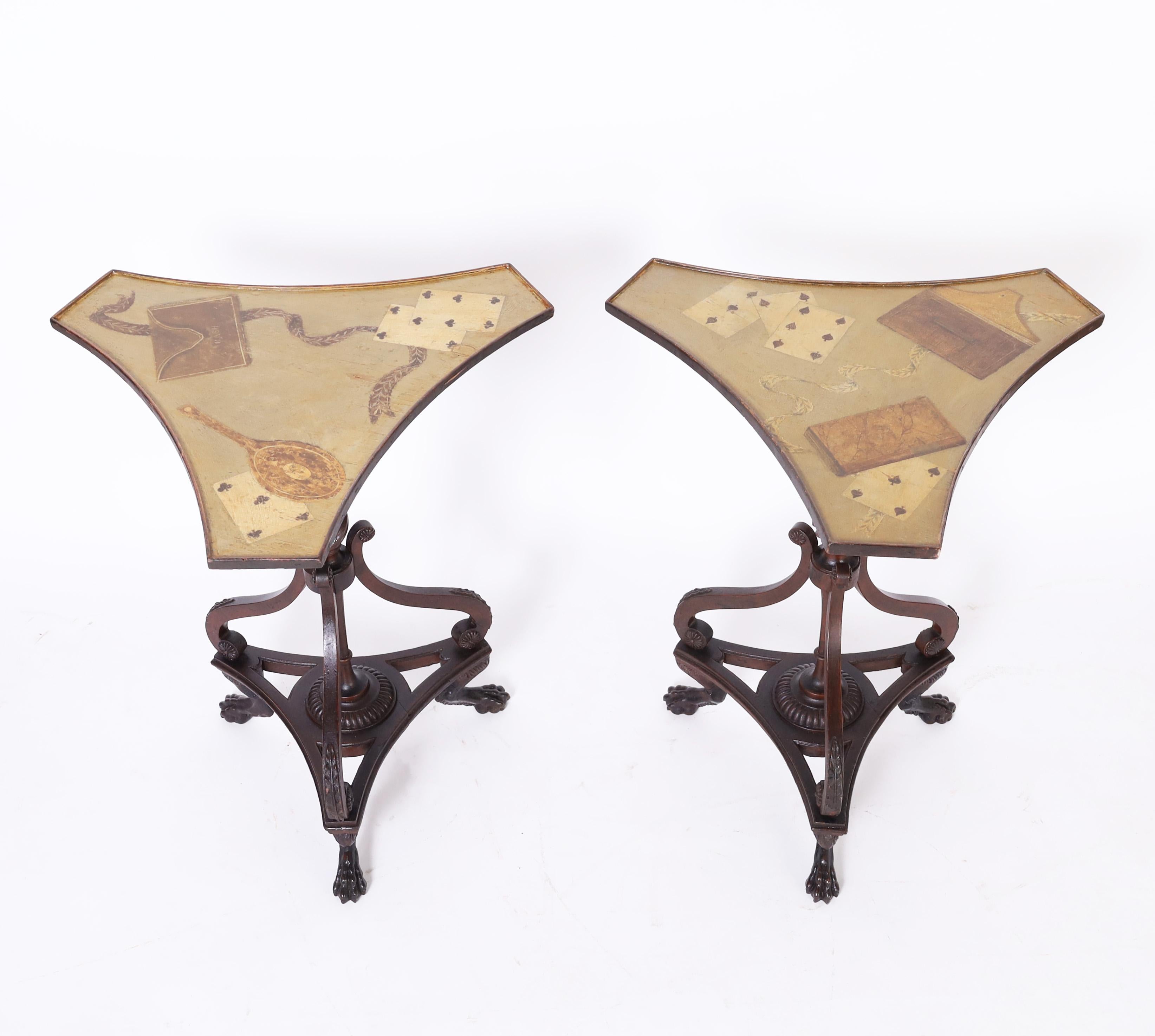 Handsome pair of antique regency style stands featuring Tromp L'oeil tops with playing cards and wallets over classical bases with turned pedestals, cabriole brackets with acanthus leaves and paw feet.