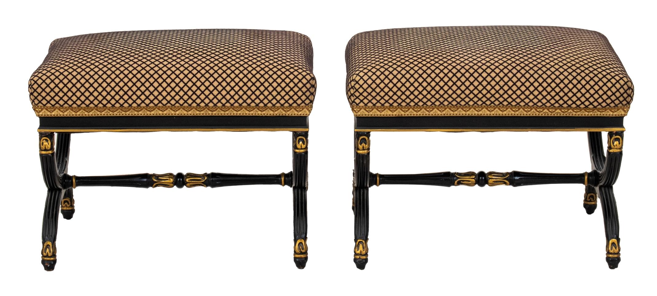 Pair of Regency style parcel-gilt black-painted curule benches, each with reeded legs and gilt anthemion details, upholstered in trellis brocade.

Dimensions: 17