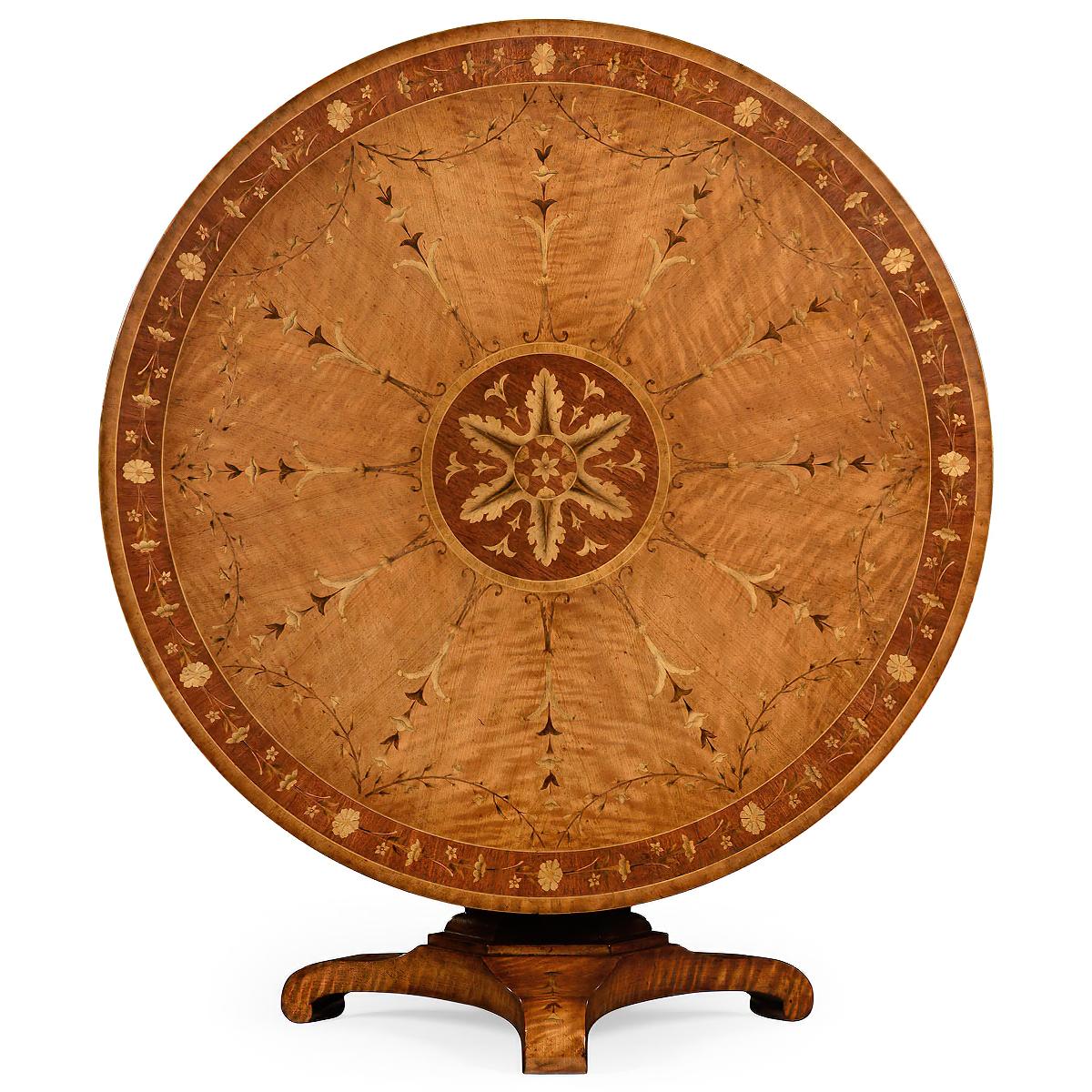Regency style round tilt-top satinwood center table (or dining table) with neoclassic designs and a scrolling trefoil base.

Dimensions: 48