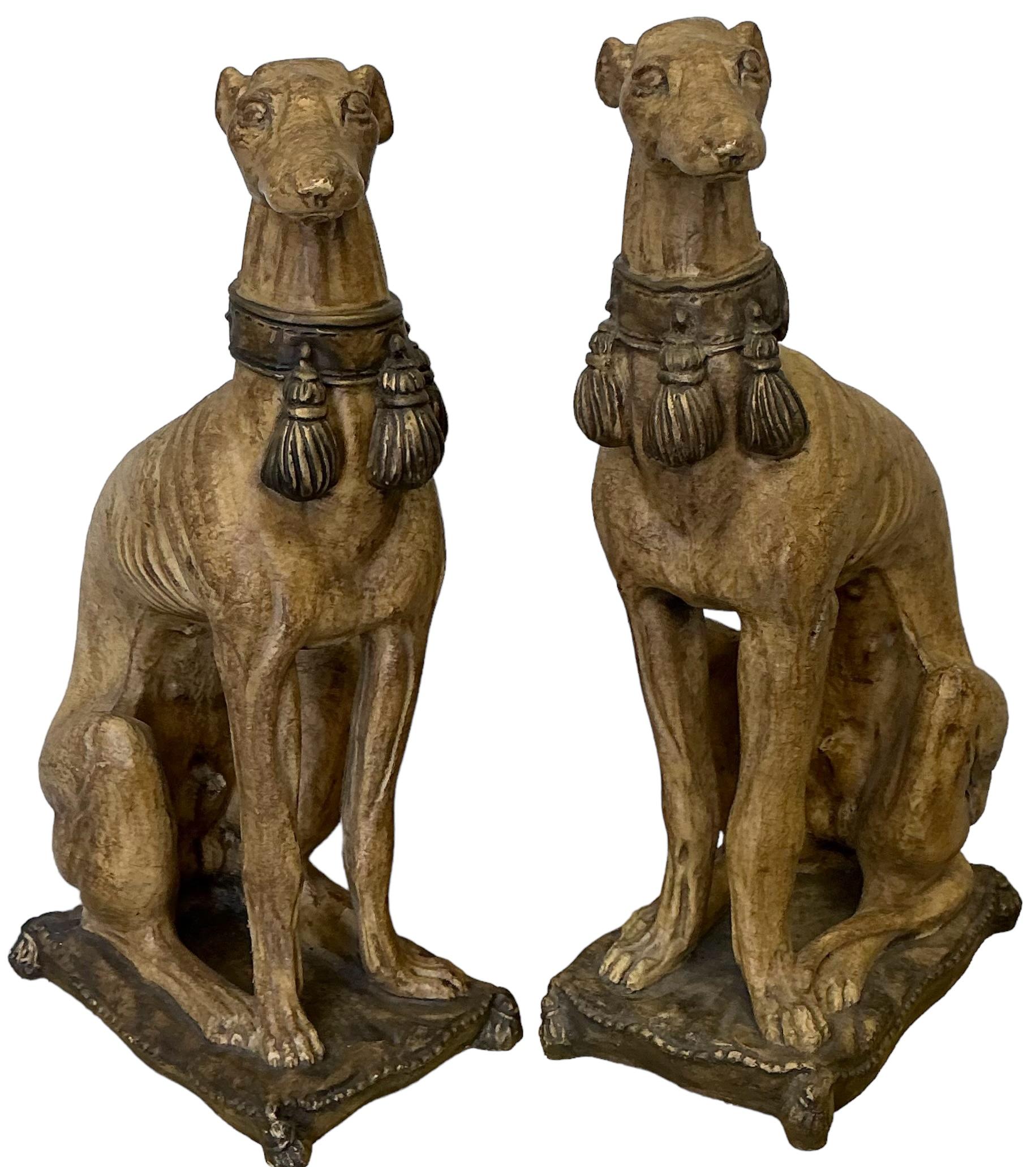 This is a wonderful pair of cast seated whippets or greyhounds with tassel collars. They are both seated on pillows. It is a heavy casting with excellent Italianate detail. They are both in very good condition and most likely date to the later part
