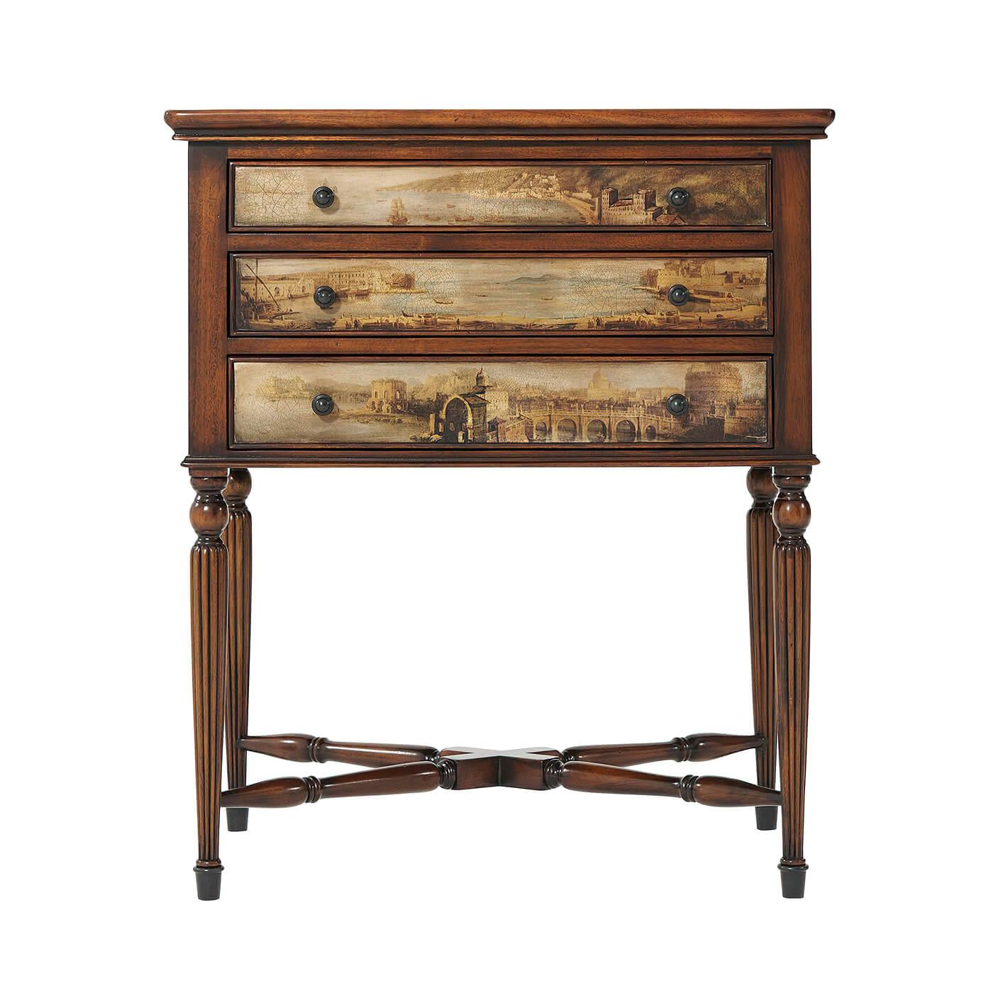 A Regency style side table or lamp table with classical landscape decoupage decoration, the rectangular dished tray top above three cockbeaded long drawers with brass handles, on turned and fluted tapering legs joined by turned stretchers