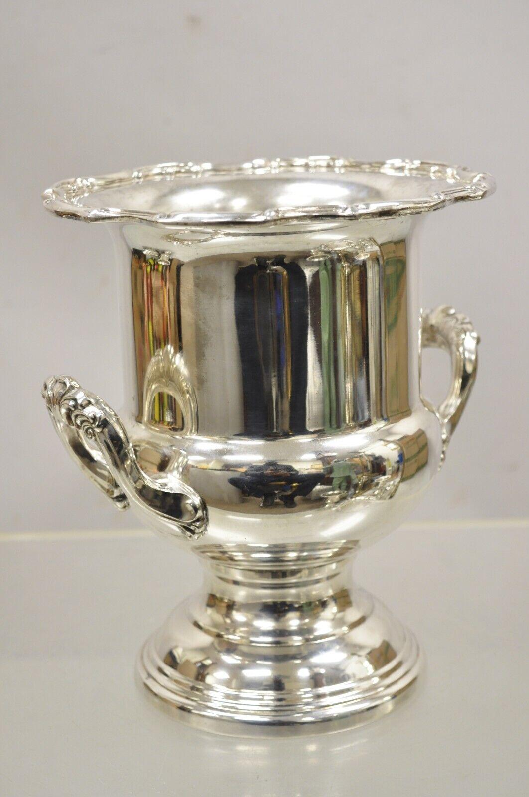 Regency Style Silver Plated Leonard Trophy Cup Champagne Bucket Wine Ice Chiller. Item features ornate twin handles, raised on base, decorated rim, original stamp, very nice vintage item, great style and form. circa Early to Mid-20th. Measurements: