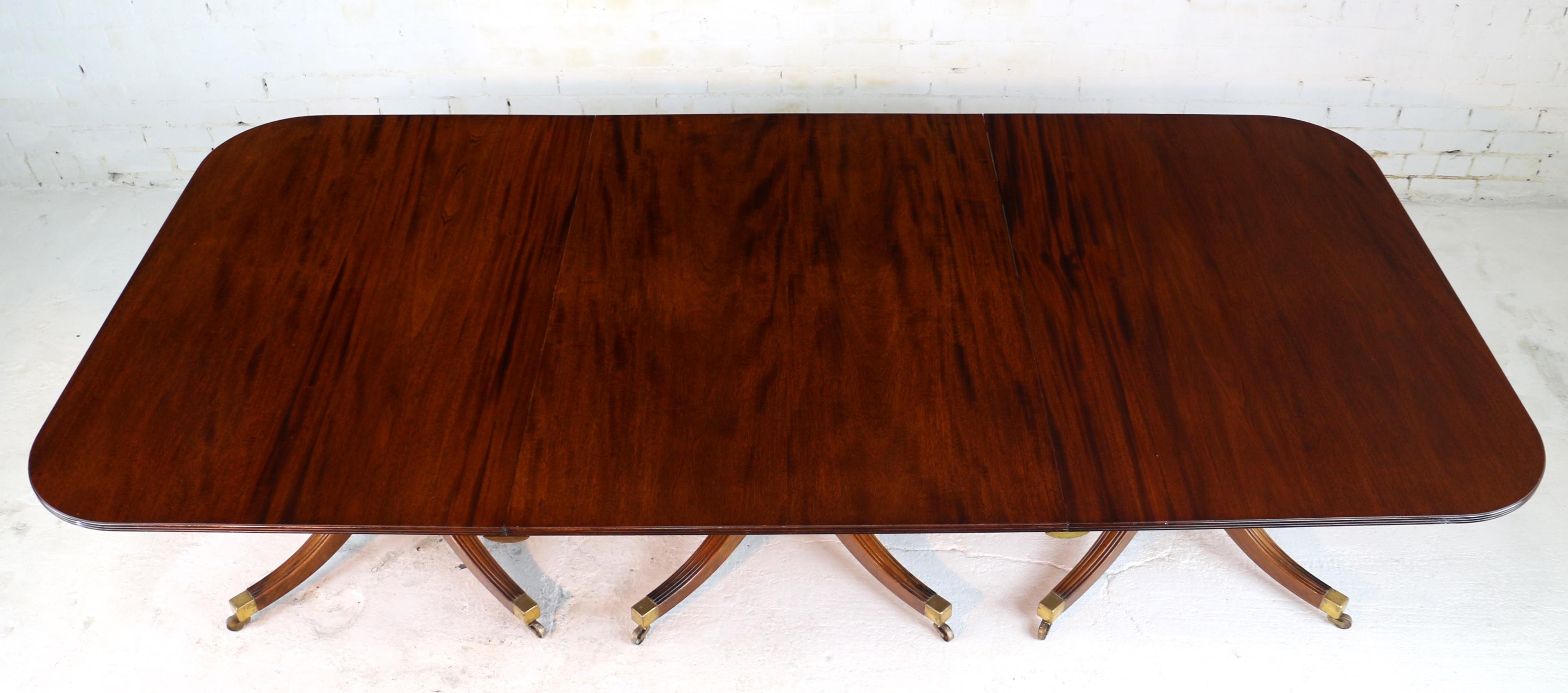 Regency Style Solid Mahogany Extending Three Pillar Dining Table and Two Leaves 10