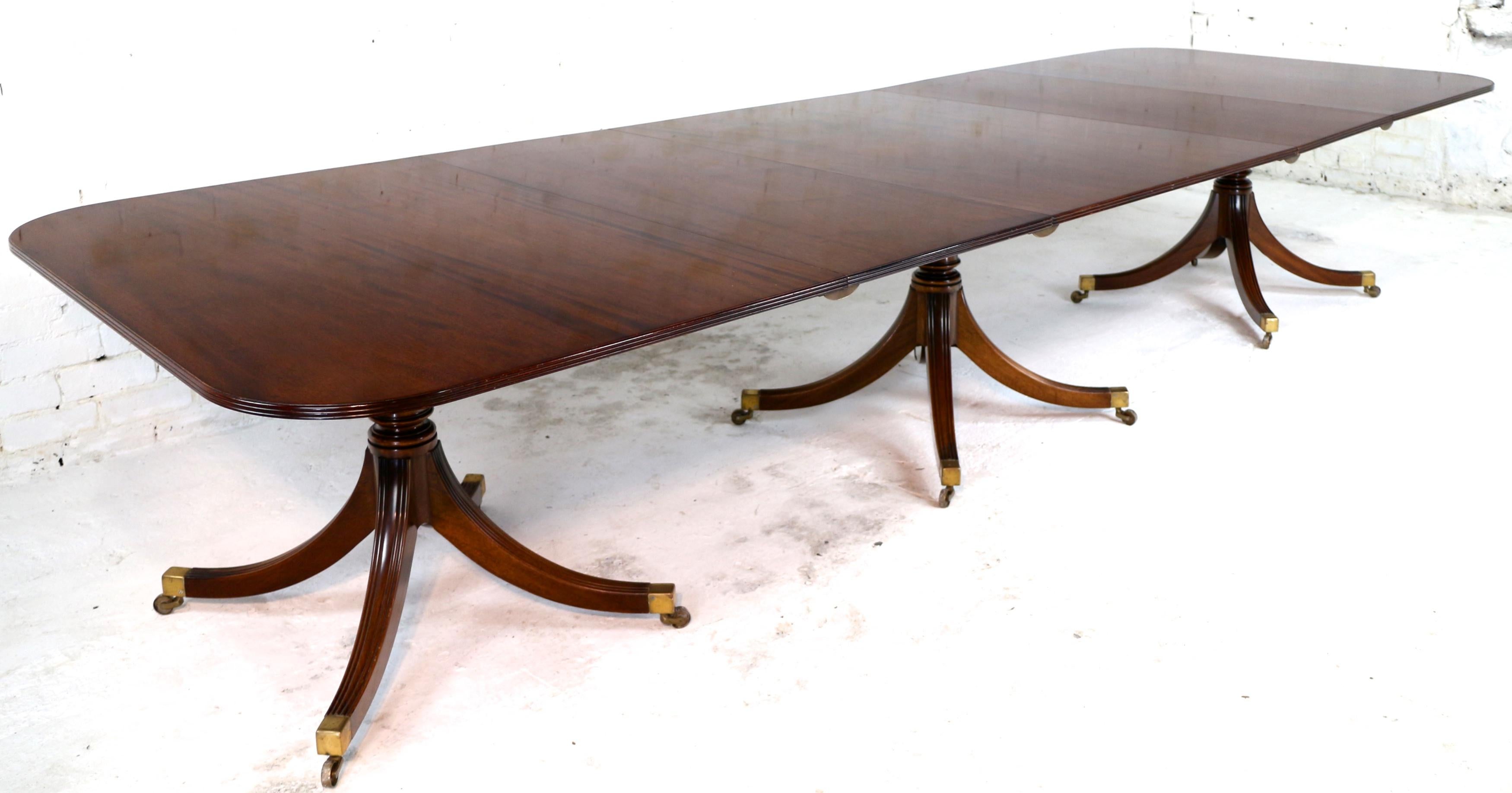English Regency Style Solid Mahogany Extending Three Pillar Dining Table and Two Leaves