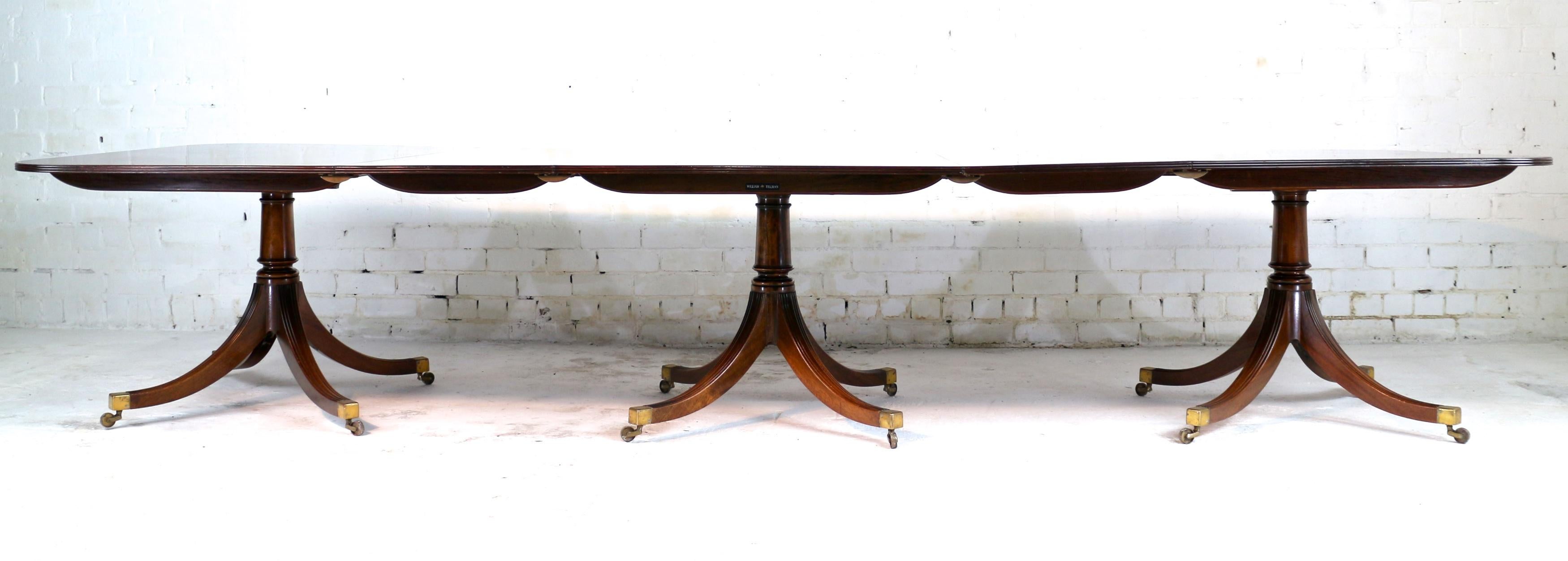 Brass Regency Style Solid Mahogany Extending Three Pillar Dining Table and Two Leaves