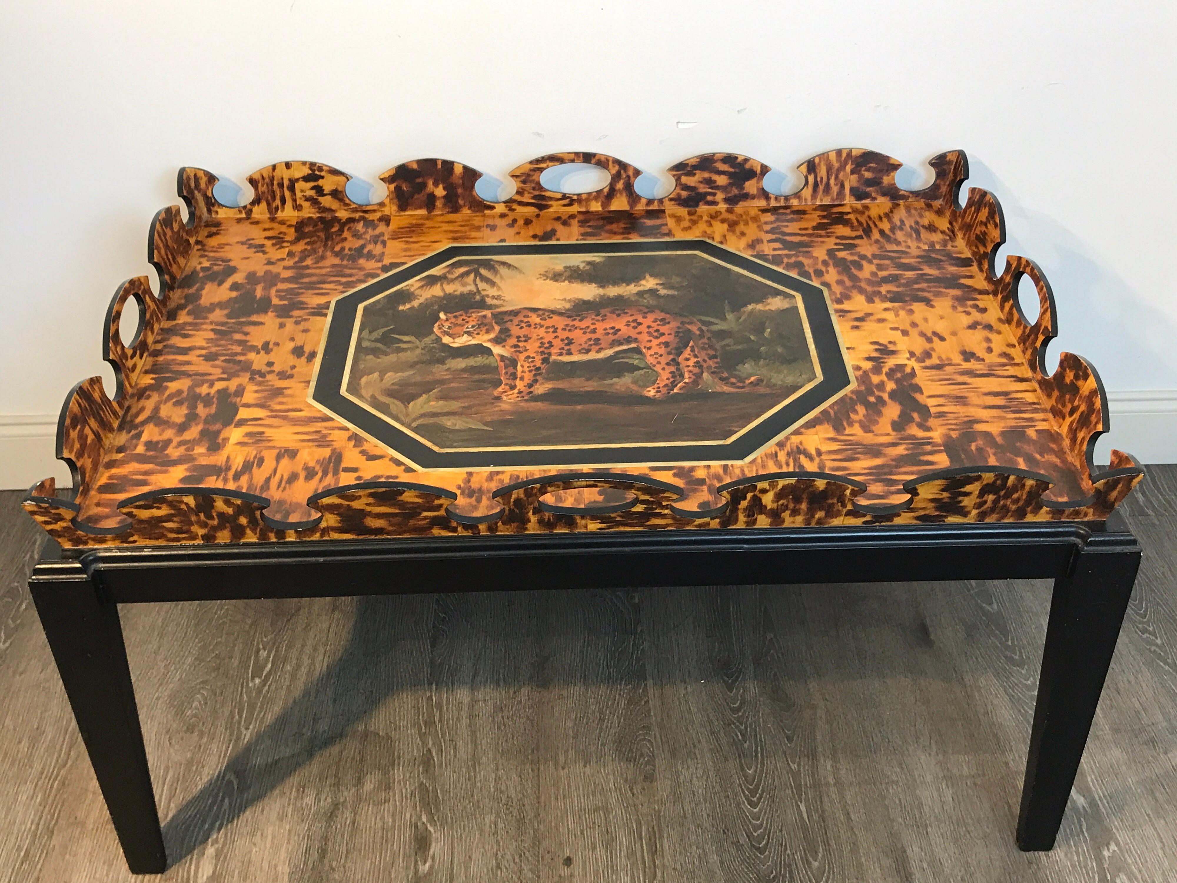 Regency style Faux painted tortoiseshell & Jaguar Motif coffee table by William Skilling, Unsigned 
William Skilling (American/British, B.1940) 
Of generous proportions with four pierced handles and 3 inch high gallery. The 40