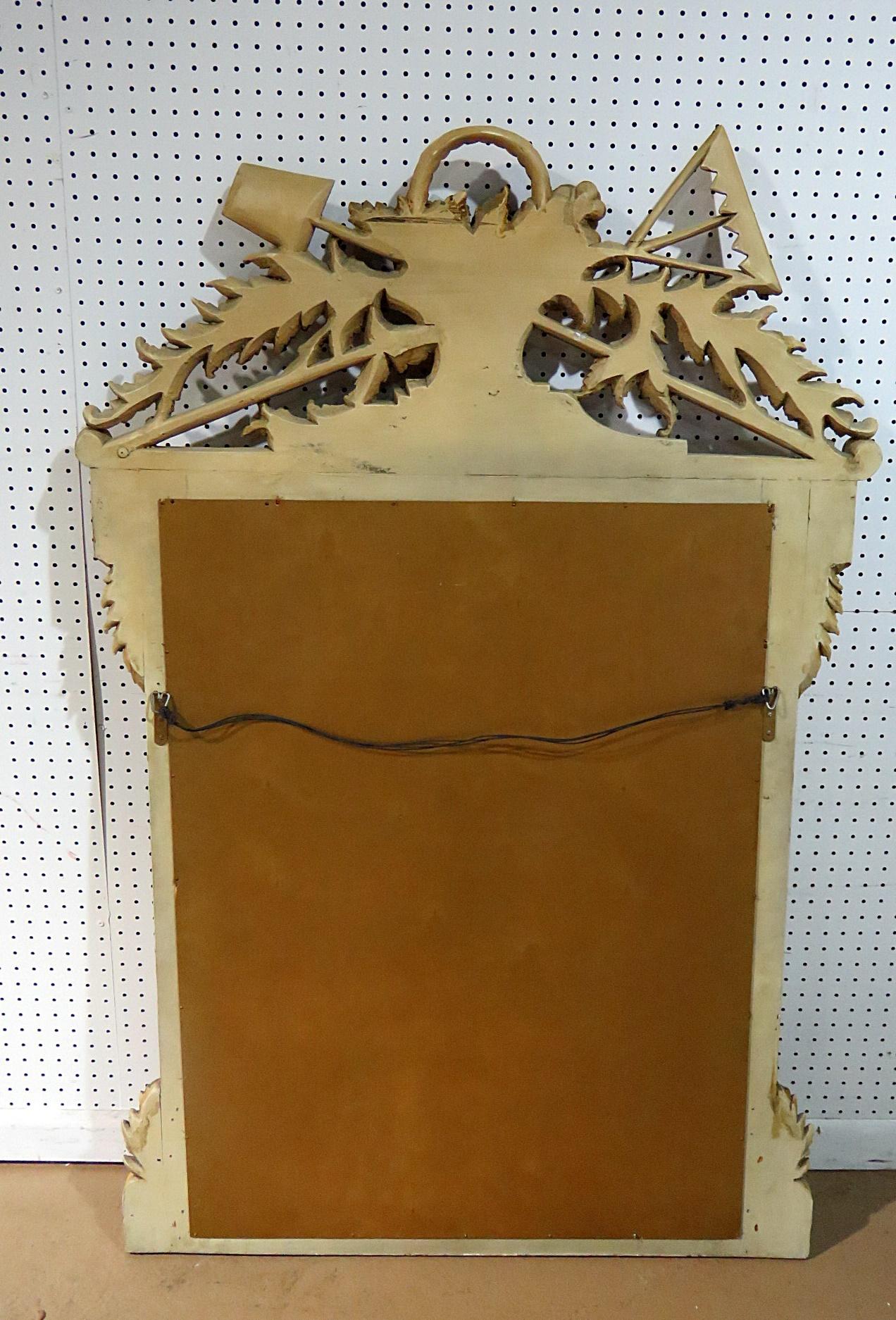 carved mirror rake and shovel