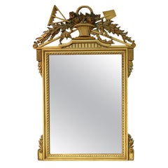 Gilded Carved French Mirror Depicting Basket of Flowers with a Rake and Shovel