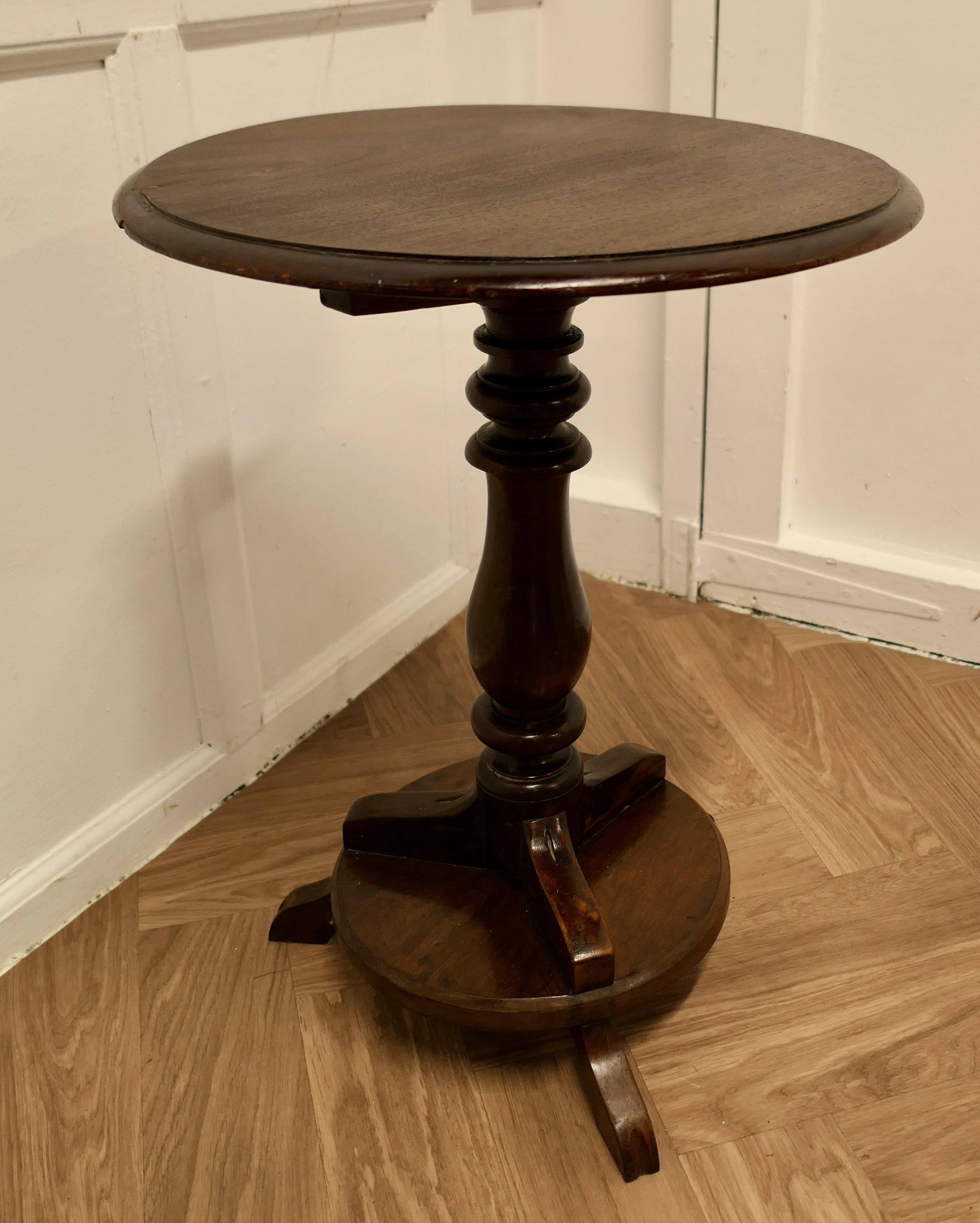Regency Style Wine Table or Occasional Table

This sturdy little table stands on a heavy 3 footed base with an attractive turned leg  
The table is in good condition for its age , there is a minor ding on the edge of the top
The table stands 25”
