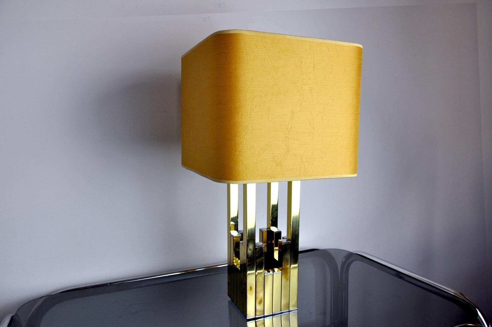 Very beautiful and rare cubiaue bd lumica lamp whose design is attributed to Willy Rizzo, produced in Italy in the 1970s. Unique lamp by its structure, comparable to a work of art. The lampshade has been made to measure with a golden canvas. This