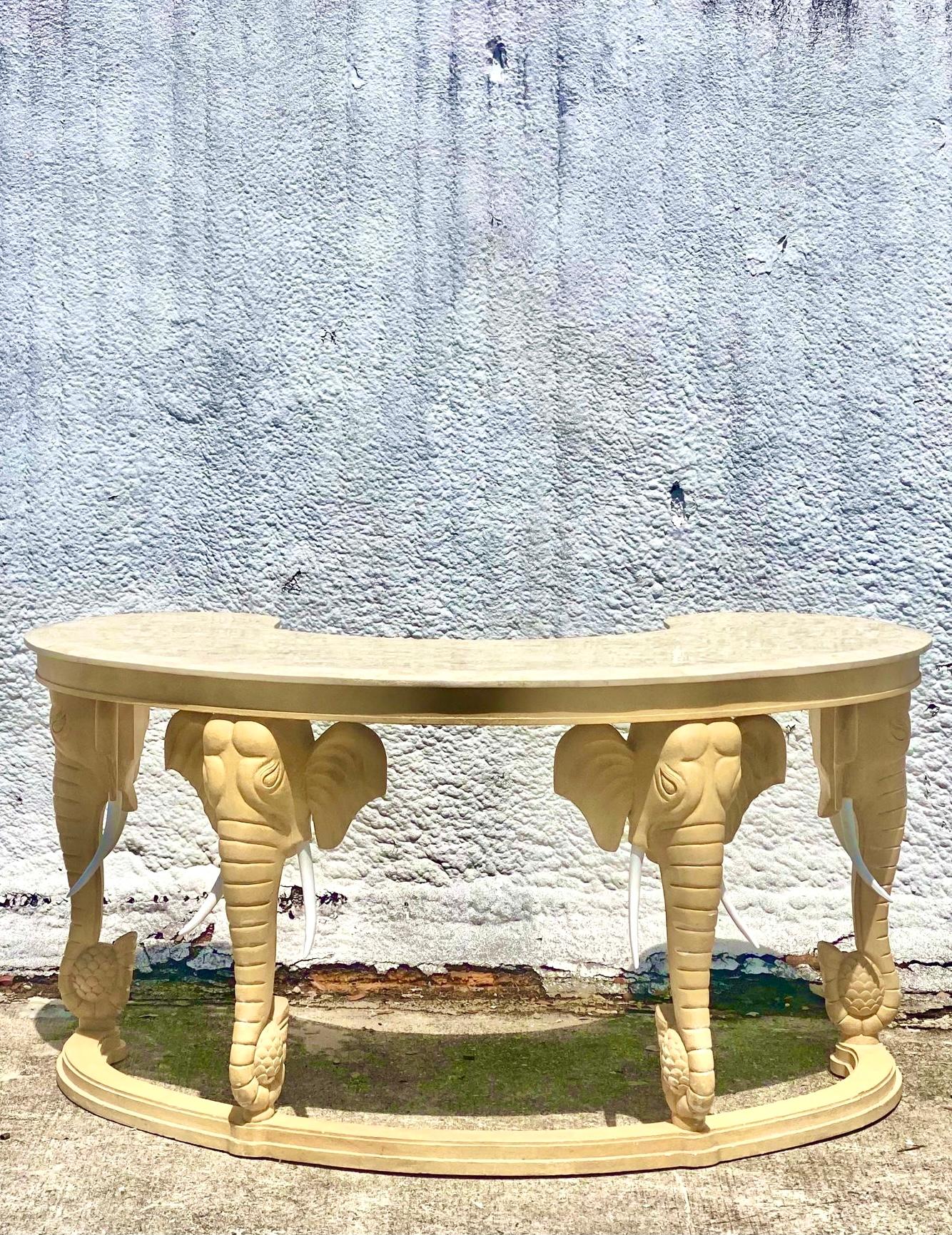 Vintage Regency writing desk and chair. Beautiful curved top with a tessellated stone surface. Striking matching chair. All tusks intact. Acquired from a Palm Beach estate.