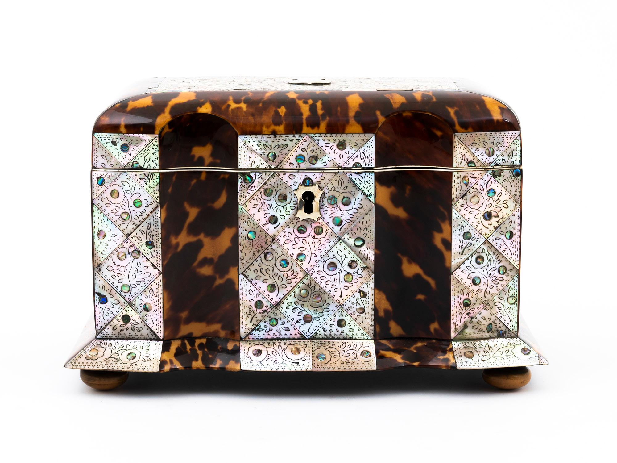 Featuring Alternating Panels

From our Tea Caddy collection, we are delighted to offer this fine Regency Tortoiseshell and Mother of Pearl Serpentine Tea Caddy. The Tea Caddy of rectangular shape veneered in both Tortoiseshell and Mother of Pearl