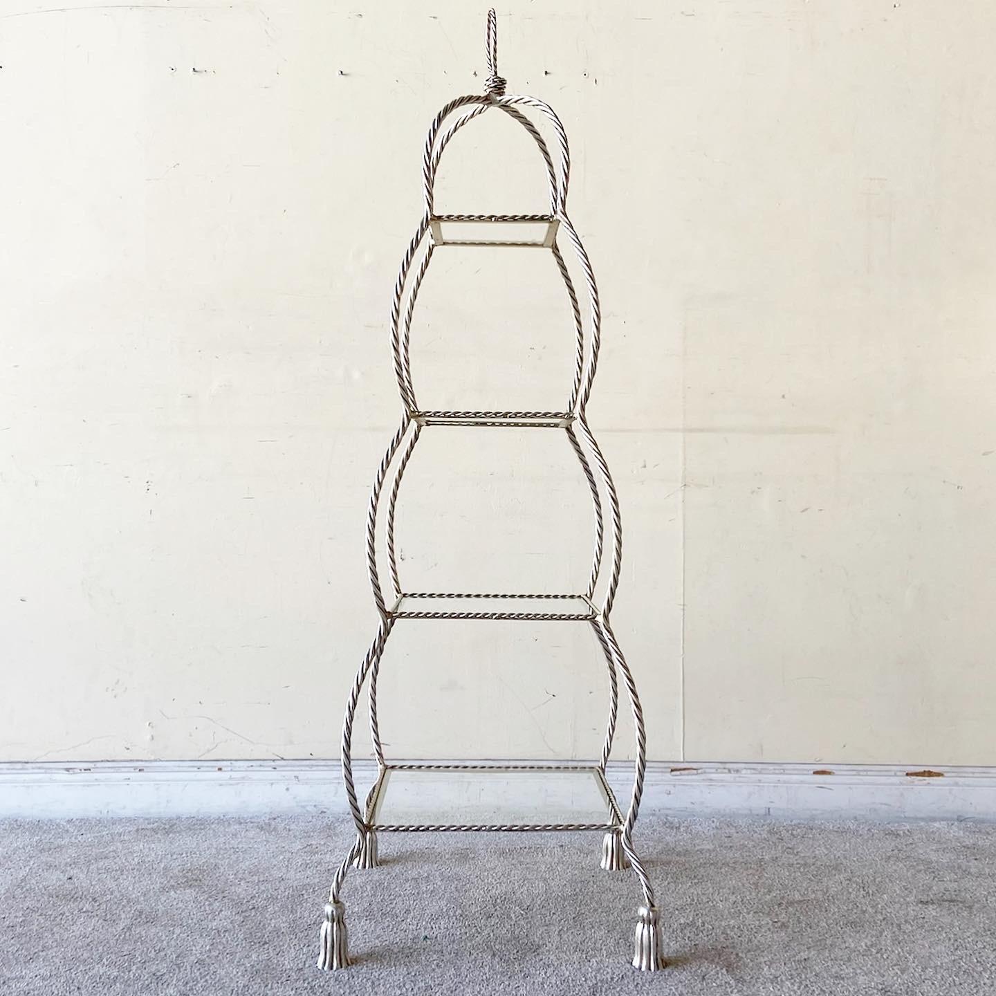 Amazing vintage regency 4 tier glass shelf Etagere. Features a twisted metal rope pagoda frame.

