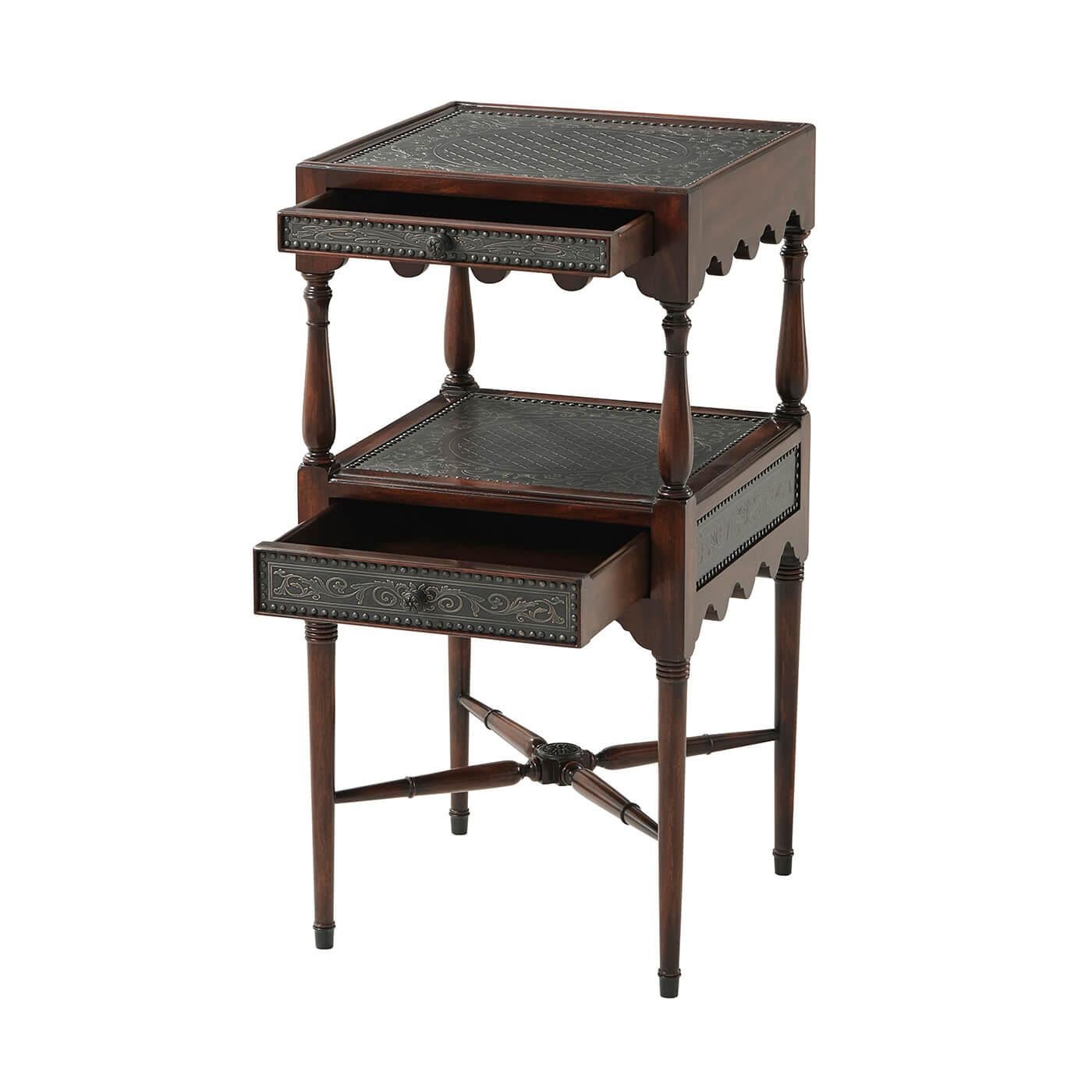 A Regency style solid two tier side table with engraved brass decoration, the top and under tier with floral frame lattice work cartouches to the panels and each fitted with a frieze drawer, between turned supports and with undulating aprons, on