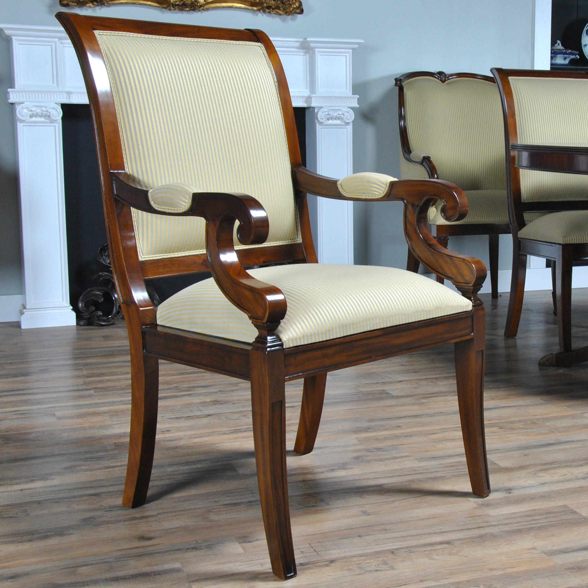This set of 10 Regency Upholstered Dining Chairs, comprising of 2 arm chairs and 8 side chairs. It has long been one of well as our most popular sets of upholstered back chairs. These are a great quality, solid mahogany, hand made set of ten chairs