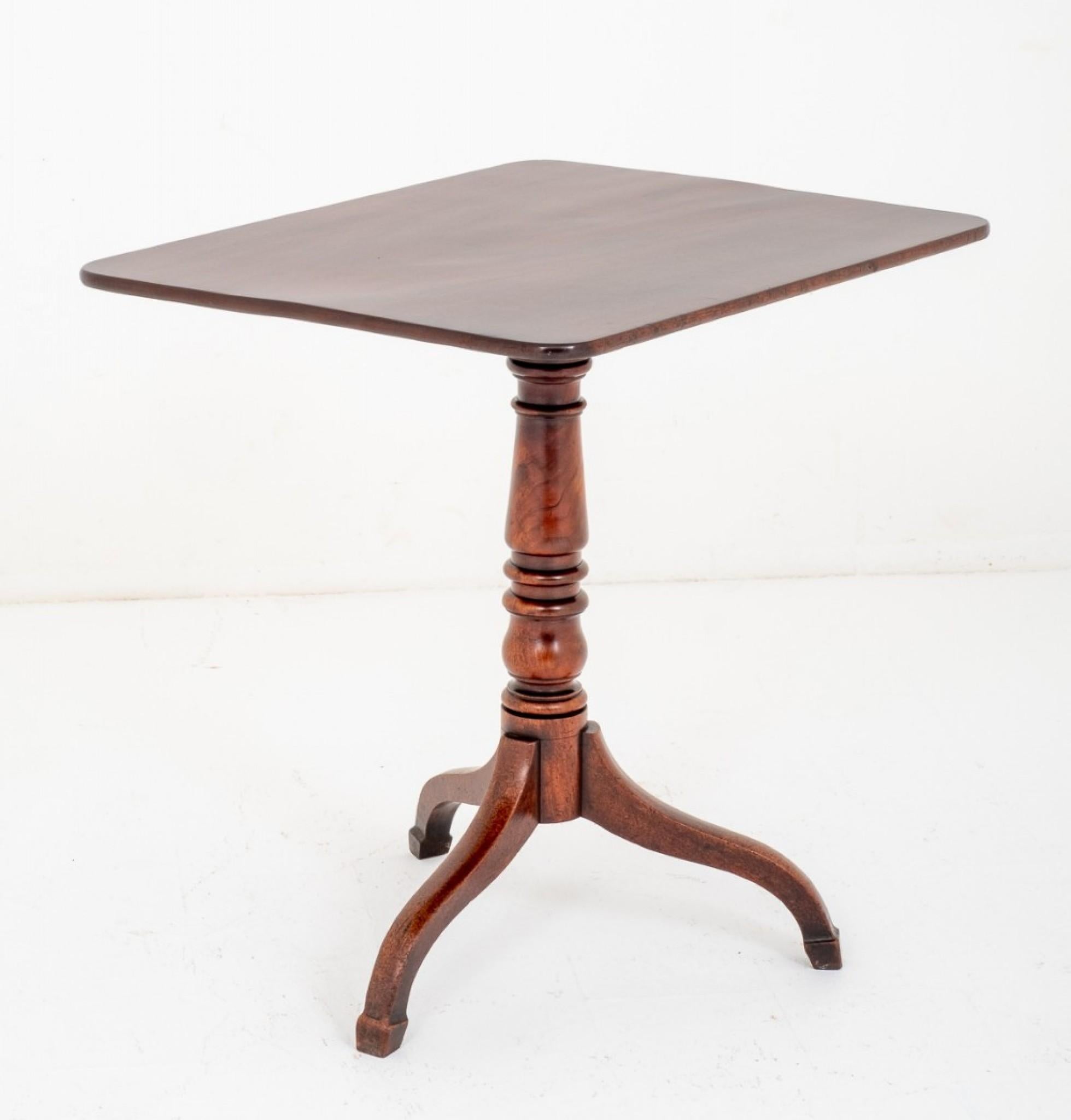 Regency mahogany wine table.
The top of the Table featuring Nicely Figured Timbers.
The Column being of a Ring Turned form and Stands upon 3 Shaped and Swept Legs with Spade feet.
A very Nice Quality Table presented in Good Condition.