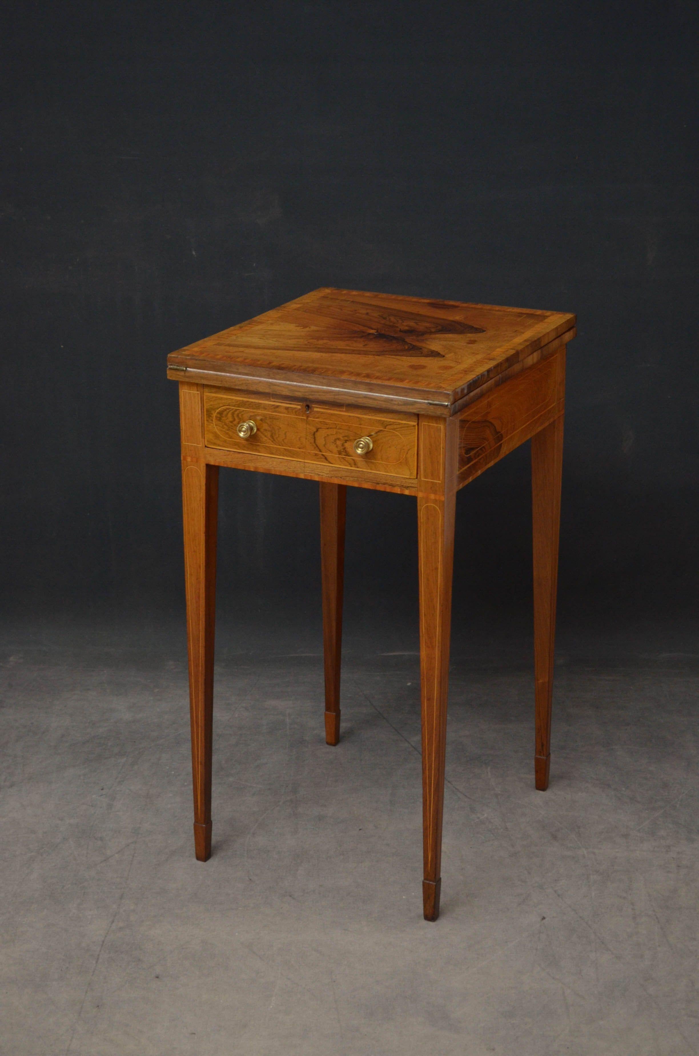 Sn5248 Fine quality Regency writing table or side table in rosewood, having book matched veneered top with satinwood string in and crossbanding which opens to reveal nubuck / suede writing surface above a slider and frieze drawer all fitted with