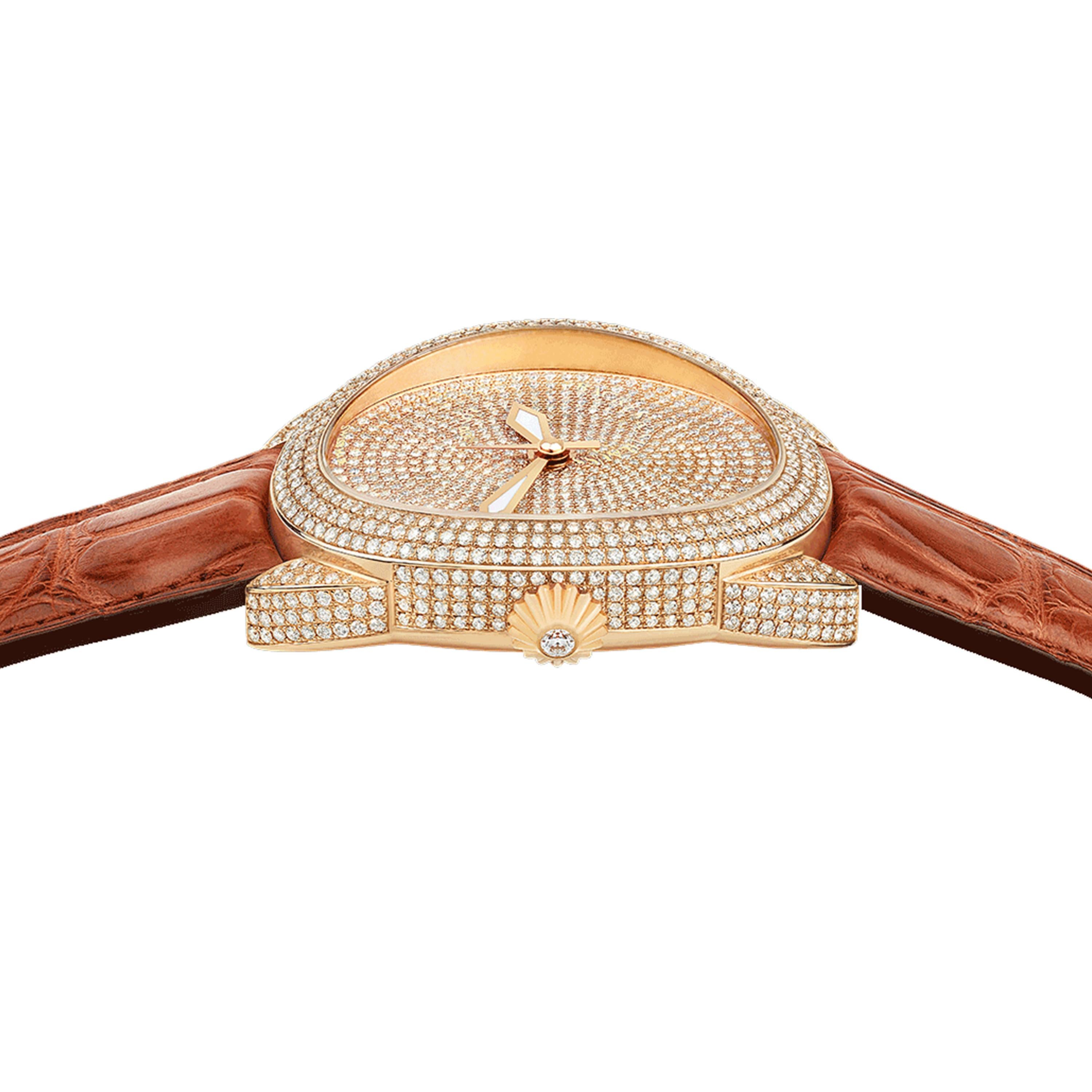 Regent Monarch 4047 is a luxury diamond watch for women crafted in 18kt Rose gold, featuring fully set diamond dial, automatic movement. The case, dial and buckle are set with white Ideal Cut diamonds. It is a 40 mm x 47 mm statement watch with the
