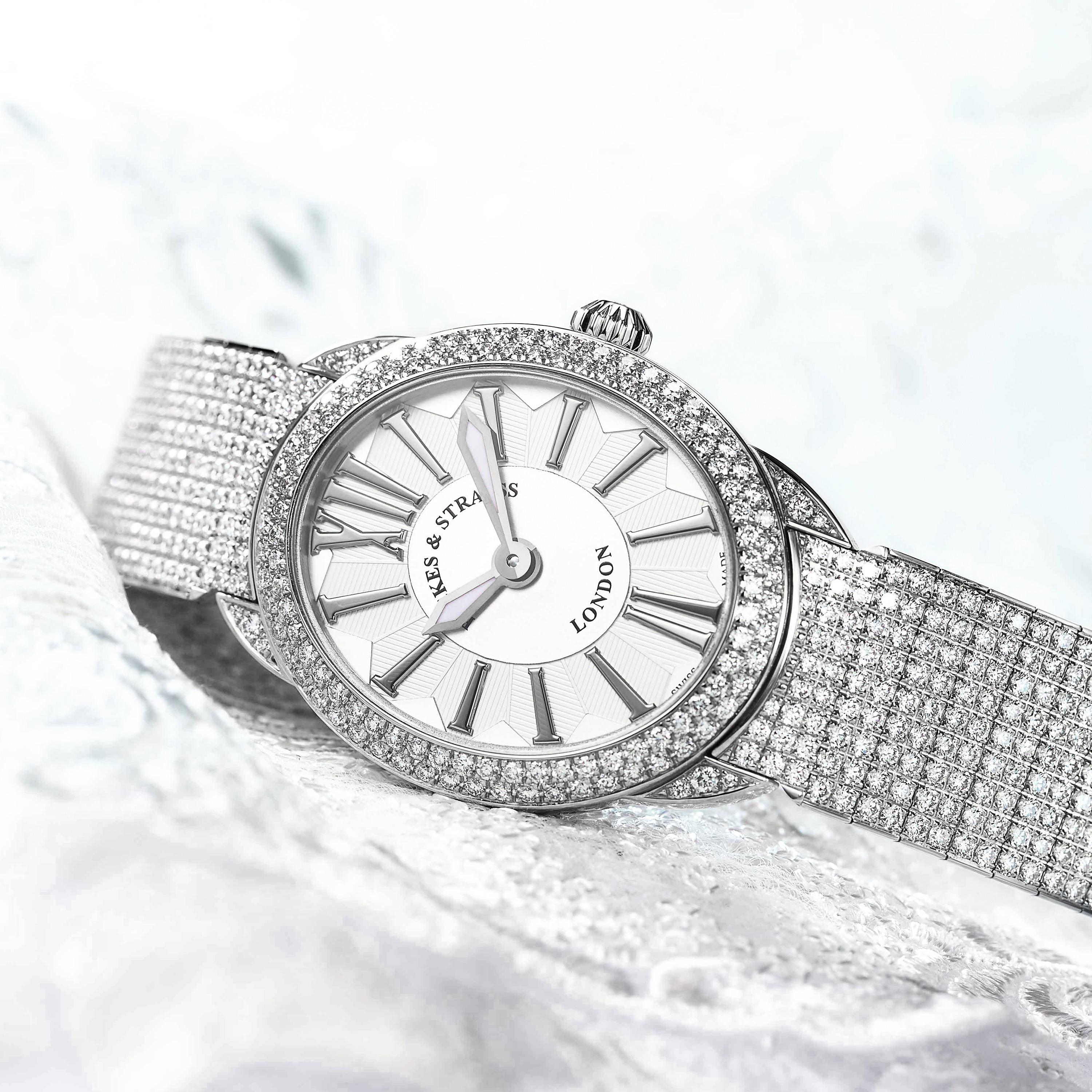 The Regent Renaissance Ballerina 2833 is a luxury diamond watch for women crafted in 18kt White gold, featuring the white oval dial, mechanical movement. The case, bracelet and crown are set with white Ideal Cut diamonds. It is a 28 mm x 33 mm slim