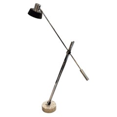Reggiani Mid Century Articulated Floor Lamp With Metal Shade
Travertine Base