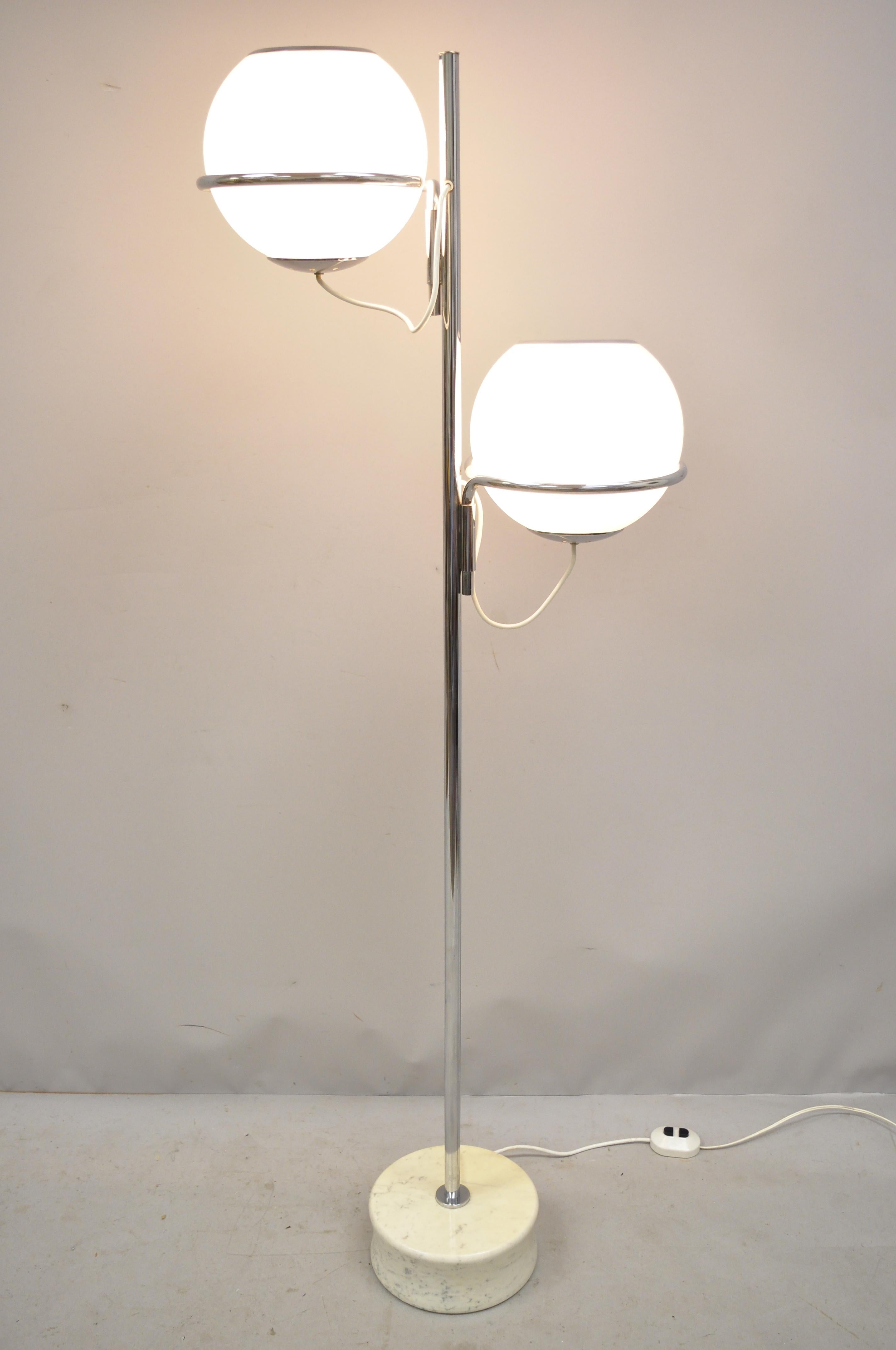 Reggiani midcentury Italian modern double glass orb chrome marble floor lamp. Item features marble base, chrome accents, glass orb shades, 3 different light settings, clean modernist lines, quality Italian craftsmanship, great style and form, circa