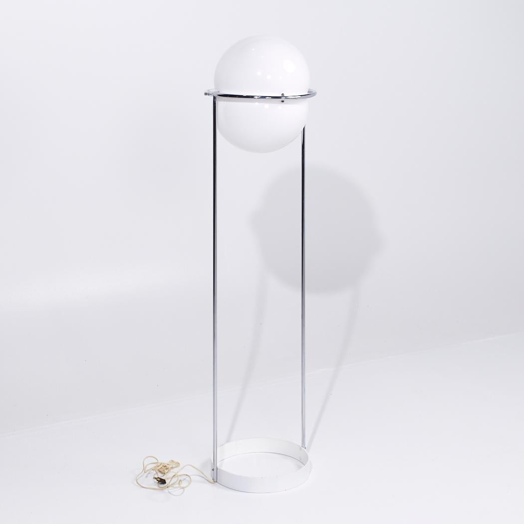 Reggiani Style Mid Century Italian Chrome Floor Lamp

This lamp measures: 13 wide x 13 deep x 54 inches high

We take our photos in a controlled lighting studio to show as much detail as possible. We do not photoshop out blemishes. 

We keep you